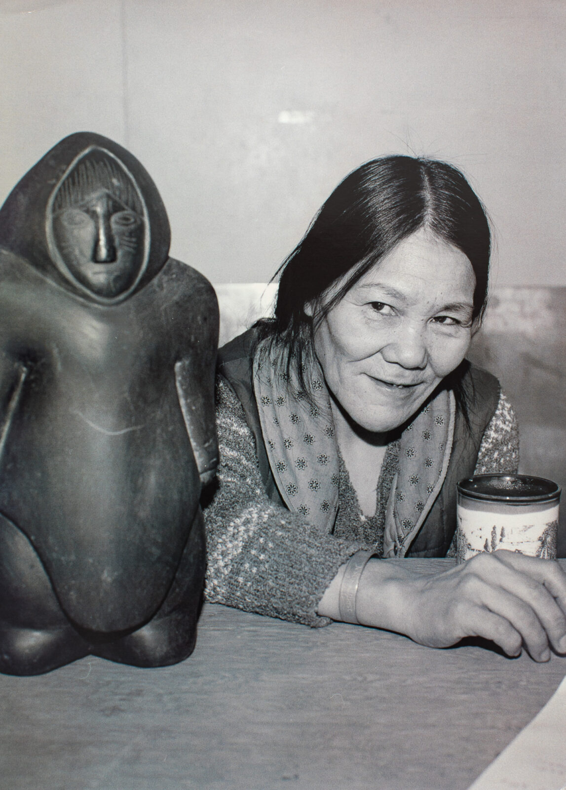 Effie Angali'taaq Arnaluaq - artist with sculpture (William Eakin photographer)