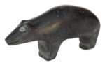 Francoise Oklaga (1924-1991), Qamani'tuaq (Baker Lake)<untitled (polar bear), c. 1970, basalt, 2.75 x 6 x 1.5 in. 